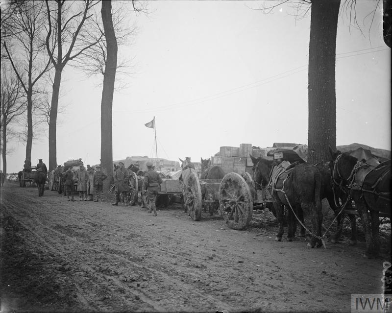 61 DIVISION, 61 DIVISIONAL TRAIN Horse transport of the Army Service Corps waiting at a roadside dump for supplies. Carnoy, March 1917.