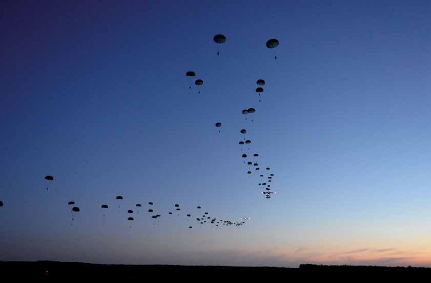 Soldiers conduct static line airdrop during Joint Operational Access Exercise 13-02, at Sicily drop zone, Fort Bragg, North Carolina, to train with paratroopers from U.S. Army s 82 nd Airborne