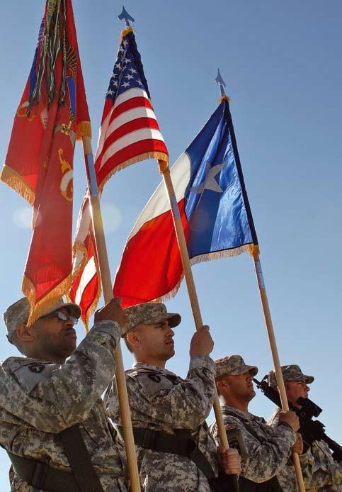 Reidy A guidon bearer from the Texas Army National Guard s 3rd Battalion, 133rd Field Artillery Regiment, from El Paso, Texas stands in front of his battery during the