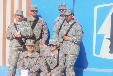 Teresa Perrin, a medical operations administrator both from the 287th Sustainment Brigade, not only serve in Iraq together, they also re-enlisted together on Dec.