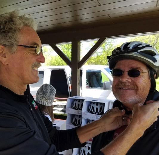 Biking and Walking Trails Mayor Tom Stiehm is fitted for a helmet at Bike Safety Day 2016 2016 was a banner year for the Biking and Walking Trails committee.