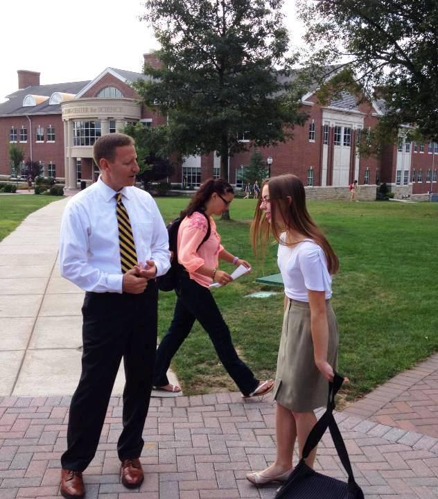 President Troha established a new tradition of greeting students and handing out complimentary coffee