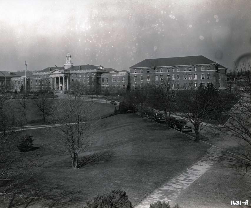 The Army Medical School s new permanent building was built on the little knoll to the west of Building 1 that had been the location of the tent-sheltered Hospital Company C in April 1909, the first