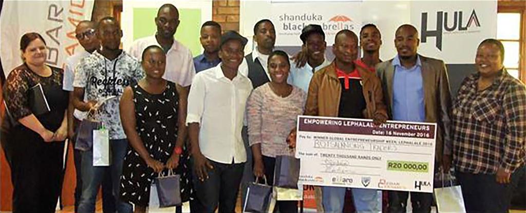Issue 32 October 2016 Lephalale best innovative business idea winner(peter Senoamadi from Botsalanong Traders)is seen here holding a cheque flanked by other entrepreneurs.