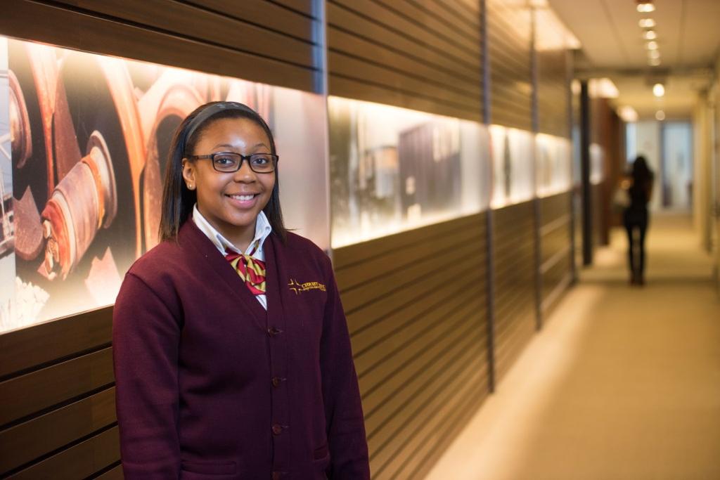 CHRIST THE KING JESUIT COLLEGE PREP OUR MISSION: Christ the King Jesuit College Prep, a Catholic school on Chicago s West Side and a member of the Cristo Rey Network, challenges and inspires its