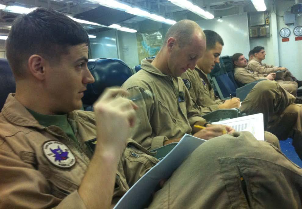 (left) Marines are engrossed in the discussions that followed.