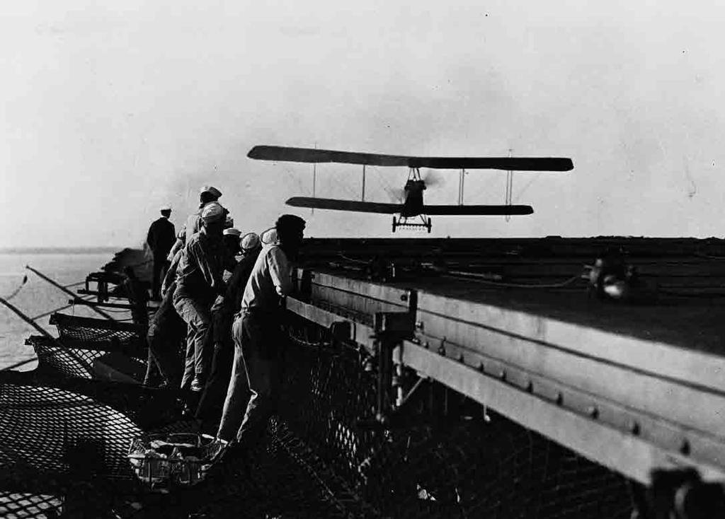 1922 continued An Aeromarine similar to the one that first landed on board Langley (CV 1) practices landings on the ship.