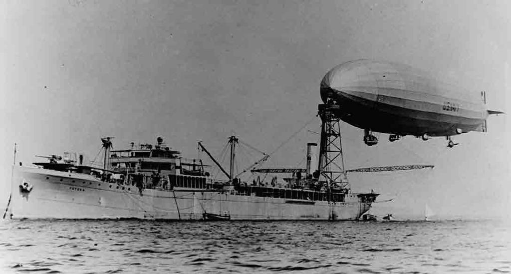1924 continued 19-N-9670 Airship Shenandoah (ZR 1) and oiler Patoka (AO 9) accomplish the first use of a mooring mast on board a ship, 8 August 1924. 8 MARCH Pilot Lt. L. V.
