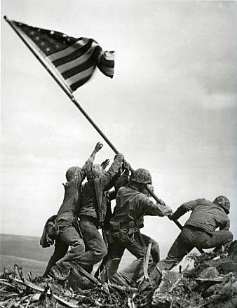 during the battle for Iwo Jima, U.S. Marines raised a flag atop Mount Suribachi.