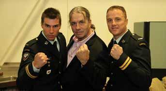 Bret The Hitman Hart with MCpl Gareth Hayter in a cross-face chicken wing. Photo: Sgt Gauthier, 1 PPCLI.