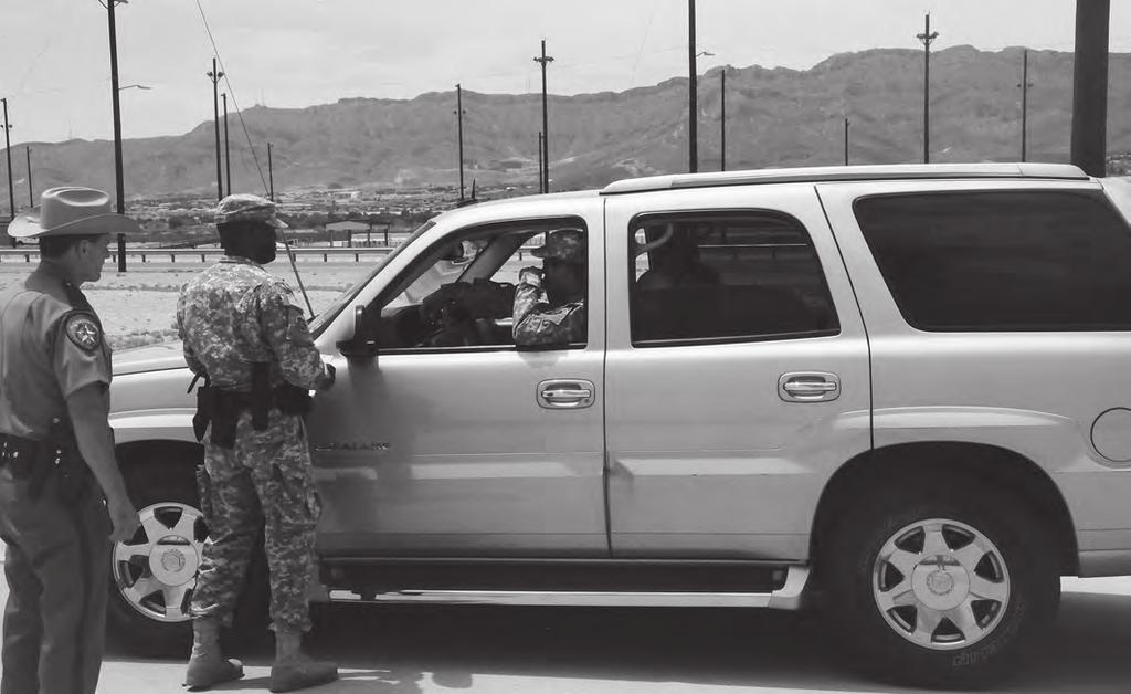 A Soldier from the 591st Military Police Company is shadowed by a Texas state trooper during a traffic stop practical exercise. and Bath Salts.