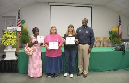 information on back page. GRAND PRIZE WINNERS (L-R): Ms.