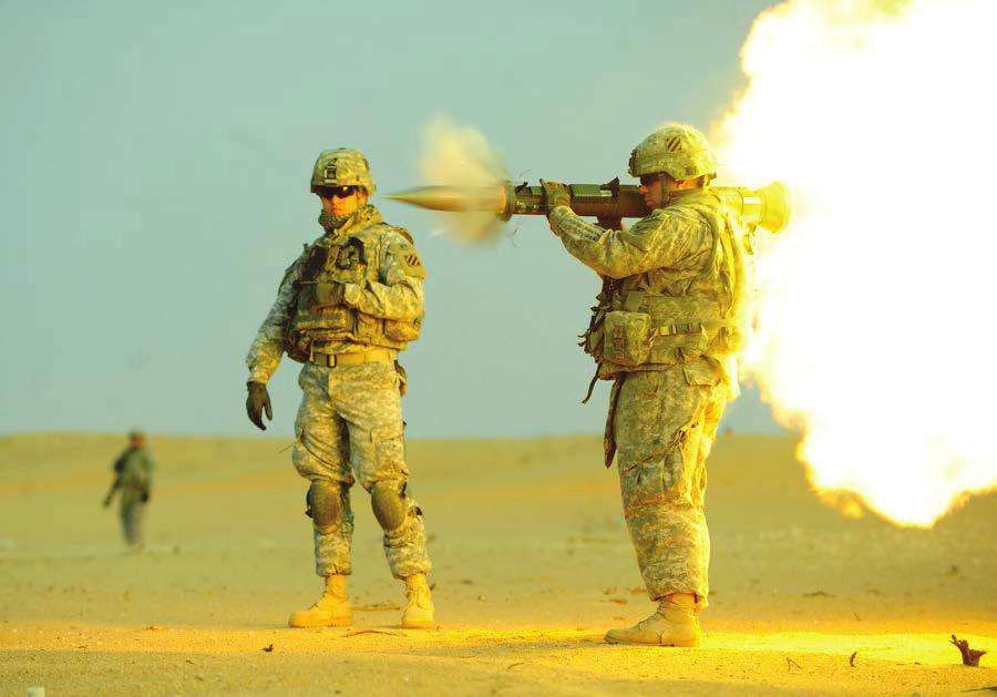Division, fires an AT-4, an anti-tank weapon, at the Udairi Range Complex, near Camp Buehring, Kuwait, Dec. 20, 2012.