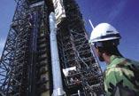 Moving the million-pound tower without damaging the rocket requires extreme care.