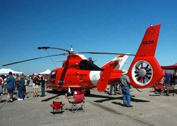 standing by the HITRON Helo USCG