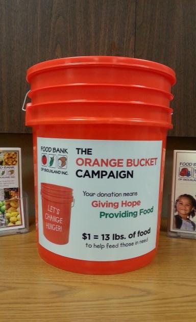 Display the food that has been collected where funds can also be collected and tracked. Arrange for your company to match the donated food and funds in some way; i.e. donating a frozen turkey, or funds for every 100 pounds.