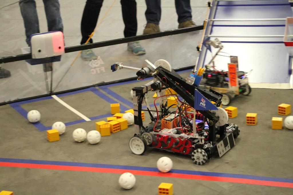 The AstroNuts robot attempts to rescue some climbers in the safety zone at Saturday s Flagstaff FIRST Tech Challenge Qualifying Tournament. Flagstaff FIRST Robotics Events: Dec.