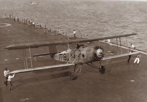 CARRIER AVIATION T4M 1 torpedo bomber on deck of USS Lexington. the Naval War College were key. The role of the latter was important in two ways.