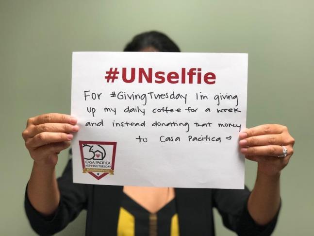 Print out our UNselfie template below and write how or why you re giving back!