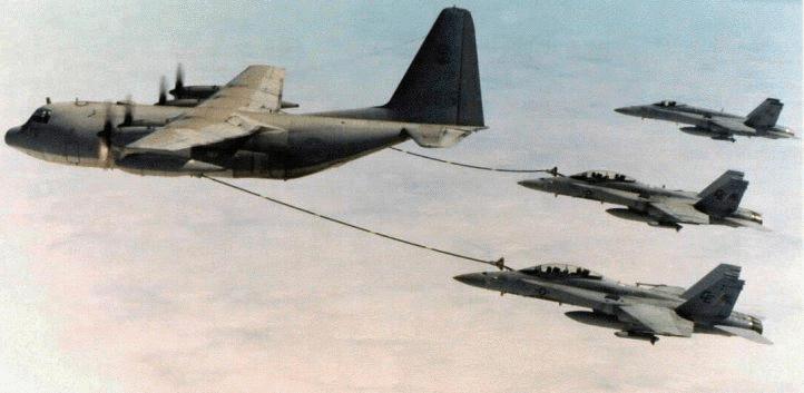 CRS-2 Figure 2. USMC KC-130 Refueling F/A-18s with Hose-and-Drogue A single flying boom can transfer fuel at approximately 6,000 lbs per minute.