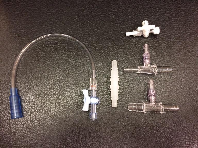 Appendix A Connection Devices to be used between chest tubes and collection device A T-connector or stop-cock to be placed between the chest tube and the collection device, the item will be dependent