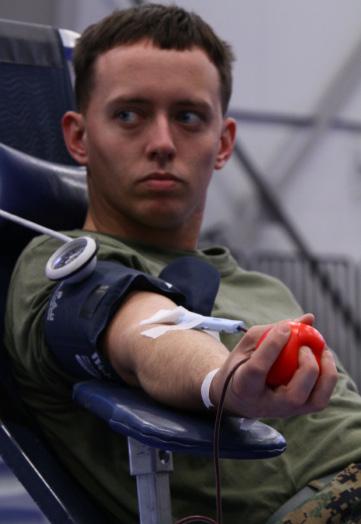 Marines and volunteers sacrificed their time to donate blood needed by doctors and corpsmen for the wounded and ill of Operation Enduring Freedom.