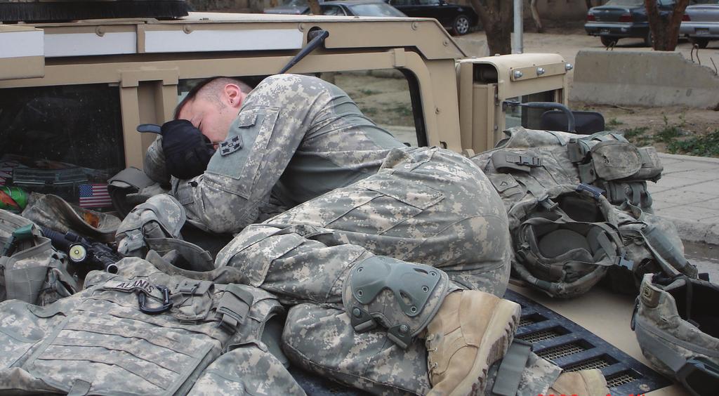 Hackbarth at Contingency Operating Base Apache sleeping on his Humvee after patrol. This is Real Hackbarth had his second eye-opening experience on Jan. 7, 2007, around 10 p.m., when his unit was helping recover a Humvee that was run over by a tank.