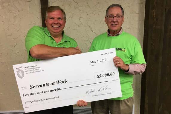 HOPE Million Dollar Round Table Foundation Awards Grant to SAWs SPELLS Tom Lipinski (left), SAWs Board Chairman, and Mike Matthews, SAWs Board and MDRT Member receive the 2017 Quality of Life Grant
