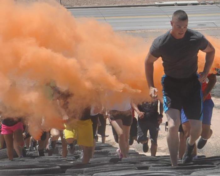 Figure 1. Participants in the 2 nd ABCT, 1 st Armored Division, Strike Hard or Go Home Obstacle Course complete a tire sprint up the hill June 11, 2015, at Strike Field, Fort Bliss, TX.