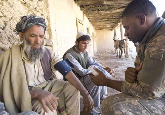 Provincial Reconstruction Team medic examines Afghan man at clinic in remote village U.S. Air Force (Keith Brown) did they develop with local nationals and was there local buy-in to their activities?