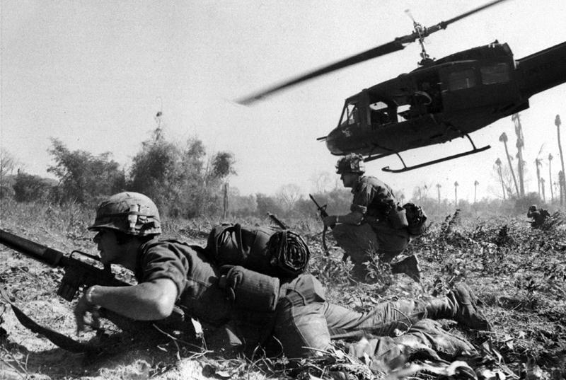 Photo courtesy of U.S. Army MAJ Bruce Crandall s UH-1D helicopter climbs skyward after discharging a load of Infantrymen on a search and destroy mission. grenade launchers to fire against the probes.