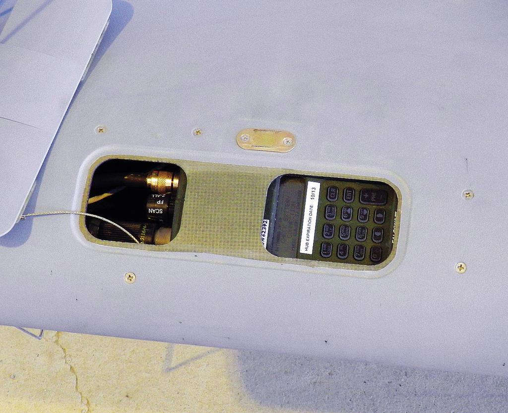Figure 1-5 AN/PRC 152 Harris Radio inside the wing of the aircraft. (Continued from page 43) by 1LT Distenfield to ensure that UAS Soldiers understood the maneuver units PIRs and other information.
