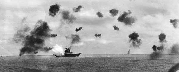 Beyond the horizon, the Japanese began their assault on the Island. As the Japanese planes got Into the air, the American planes swooped in to attack the Japanese fleet.