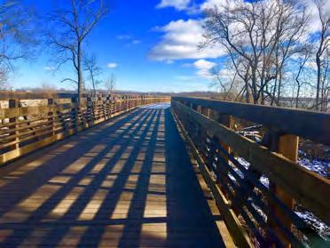 The newly completed Lower Yahara River Trail boardwalk spans Lake Waubesa, providing an off road trail connection between Madison and McFarland that didn t previously exist.