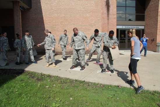 GREATER CLEVELAND CHAPTER SUPPORTS CLEVELAND AREA JROTC, cont. The activity shown represents an obstacle crossing.