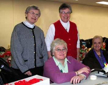 ..pg 7 Sisters Give Christmas Joy Sisters Clare Joseph Farabaugh, RSM, Mary Eleanor Thornton, RSM, (standing, left to right), Breige Lavery, RSM, and Ruth Morgan, RSM, (seated, left to right) help