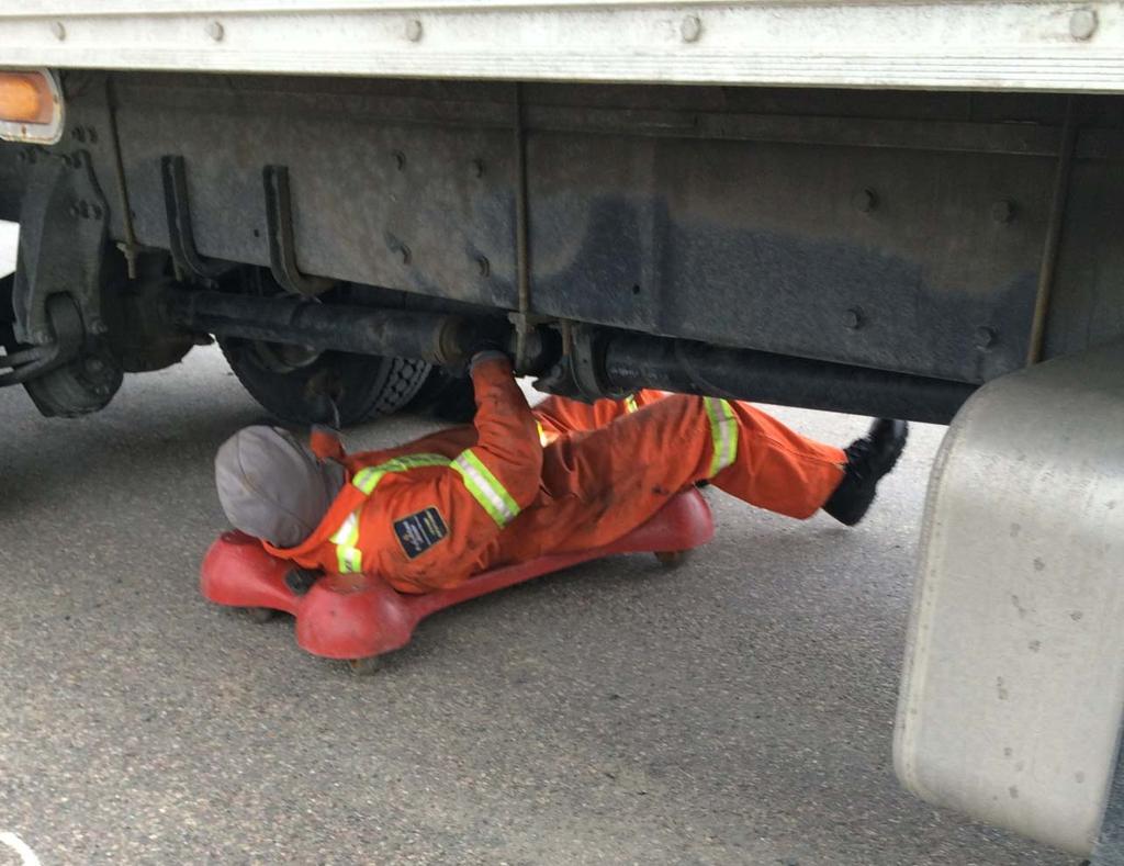 Safety and Weight Inspections of Commercial Vehicles Figure 1 Service NL Motor Registration Division CVSA Level I Commercial Vehicle Inspection Source: Picture taken by OAG when observing operations
