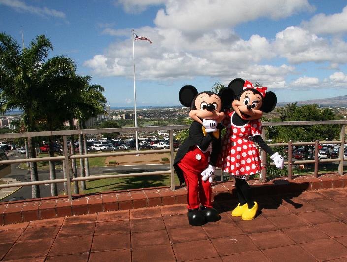 Mickey and Minnie take time out from their visit to Tripler s Pediatric Ward and Clinic to enjoy time on the commander s lanai.