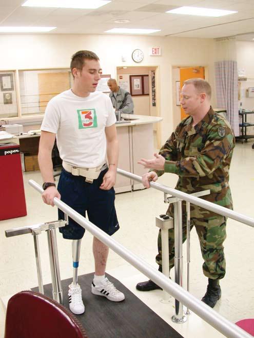 t PFC Tristan Wyatt practices gait in the physical therapy clinic.