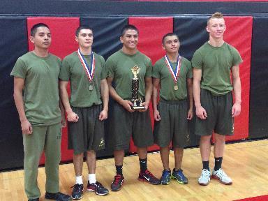 The required physical training (PT) uniform consist of the green MCJROTC shorts and a standard