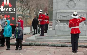 In the early hours of the chilly morning, MCpl Eckert mounts the L EDMN R Vigil Party at the Edmonton City Hall Cenotaph.