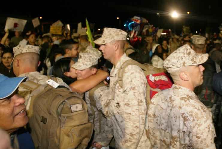 Marines with Combat Logistics Battalion 5, 1st Marine Logistics Group (Forward), reunited with their friends and families here, Oct. 23.