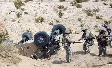Marines participate in Enhanced Mojave Viper training Story by Lance Cpl. Khoa Pelczar 1st MLG MARINE CORPS BASE TWENTY- NINE PALMS, Calif.