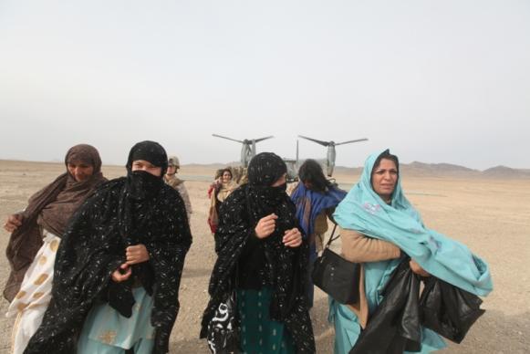 with Afghan men and women in the districts and outlying villages Deployed female engagement teams to establish links with Afghan women