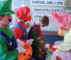Munchkin Masquerade Each Halloween downtown Boulder is invaded by thousands of tiny ghosts & goblins, dinosaurs &
