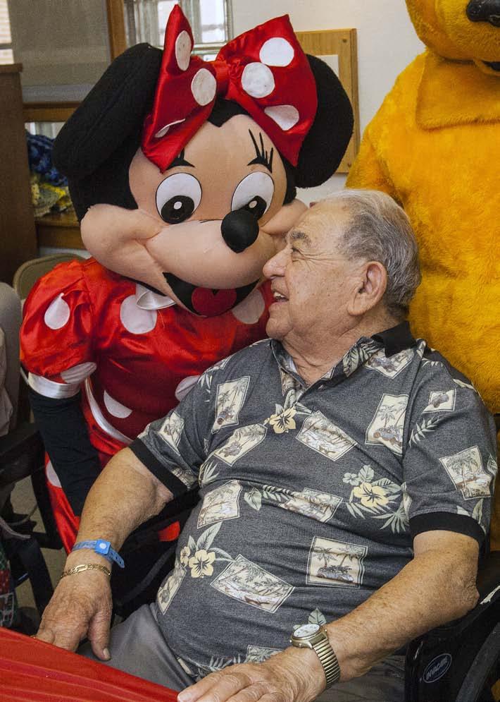 16, the Home s residents were getting a taste of Walt Disney World, which included staff members dressed up as Mickey and Minnie Mouse and Winnie the Pooh, as well as