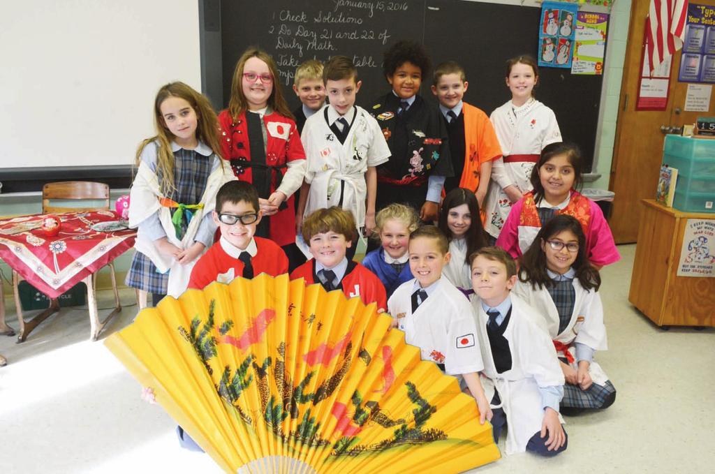 January 19, 2017 CATHOLIC NEW YORK 21 Catholic Schools Week} Activities CULTURE LESSON Third-grade students at St.