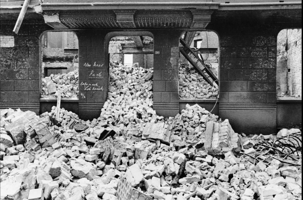 One of the first major targets of the Above: Bomb damage in Hamburg following Anglo-American raids of July 1943.
