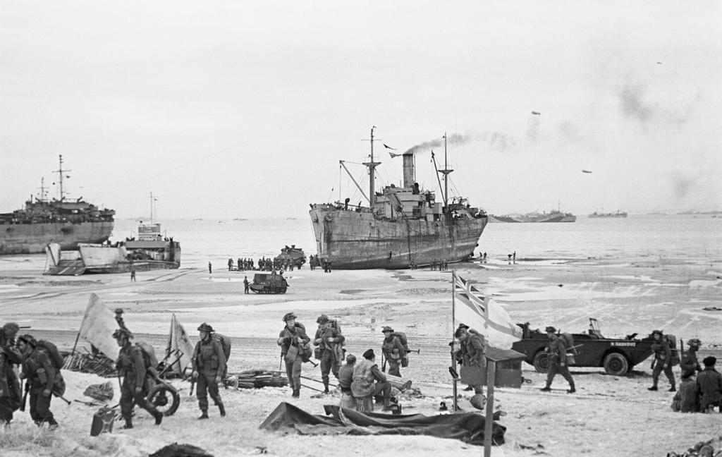 6 C Operation Argument and the D-day Operations British troops come ashore at Normandy, France, during the D-day operation that launched the Allied invasion of occupied Europe, June 7, 1944.