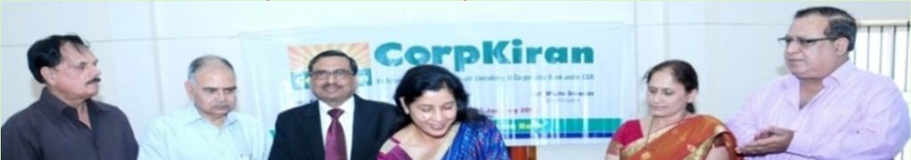 The Bank sets up CorpKiran for CSR Activities Smt. Sumitra Bansal, President, CorpKiran launching the emblem of CorpKiran in the presence of Smt.